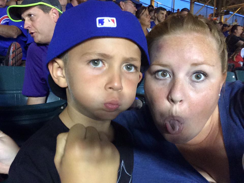 Megan and her nephew at his first Cubs game.
